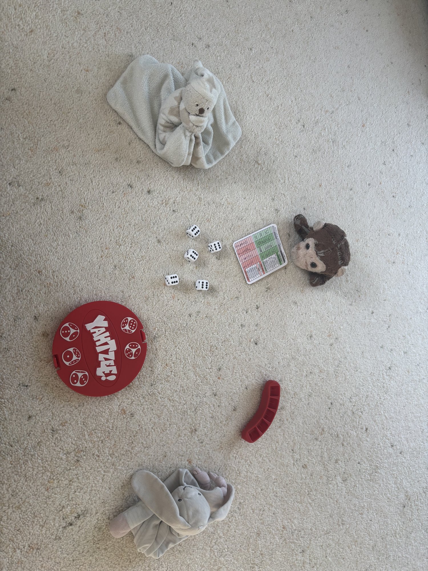 Softy, Bear and Bunny playing Yahtzee on the carpet